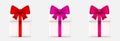 Gift box with a bow. Set of gift boxes with red, pink and purple bows. Royalty Free Stock Photo